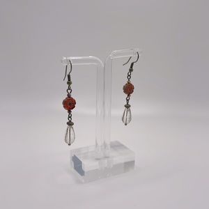 2-1/4” drop earrings. Red & clear glass with brass & gold accents. Handmade USA